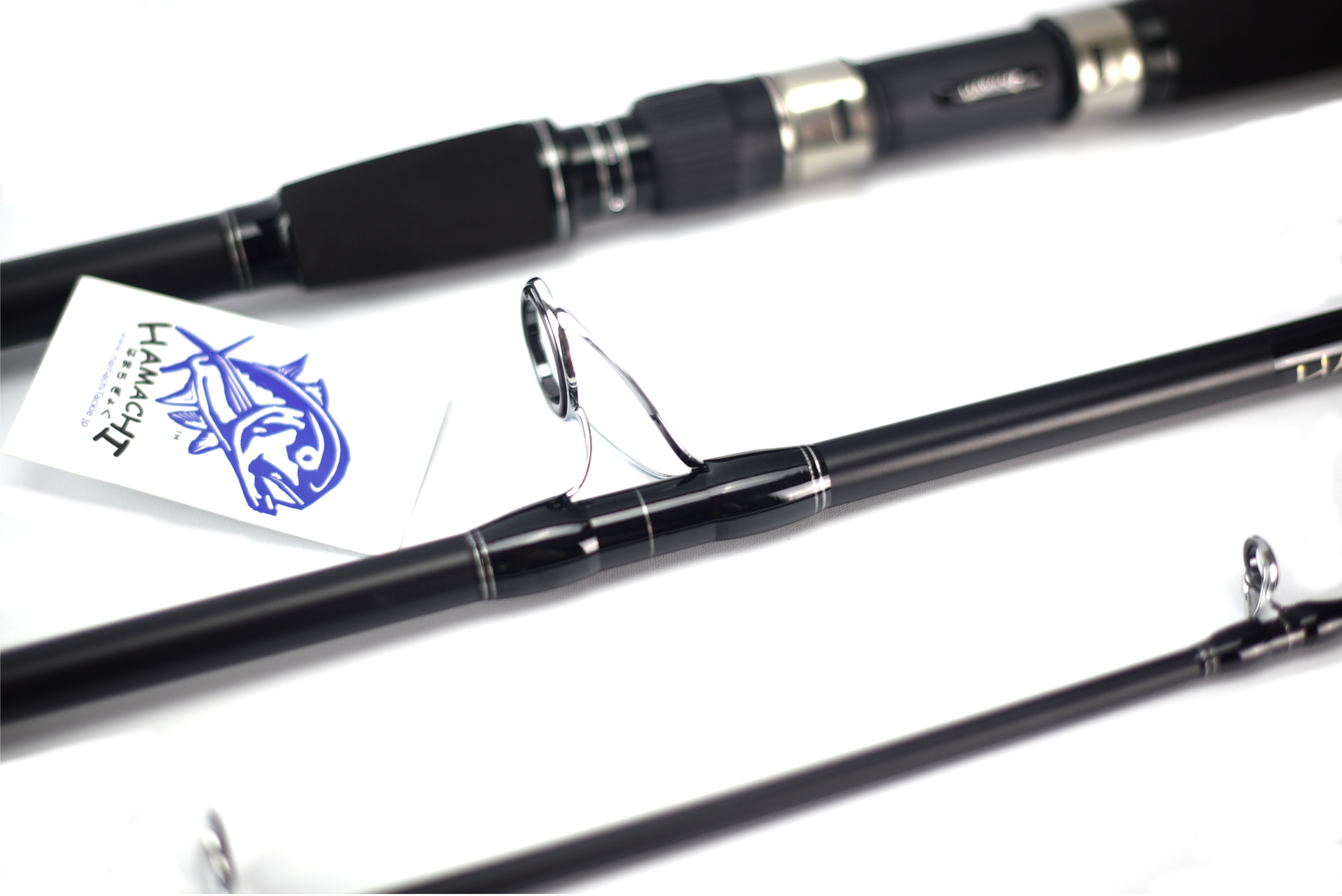 Close-up of the Hamachi XOS GT'n'Doggie rod blank and guides with Hamachi hang tag